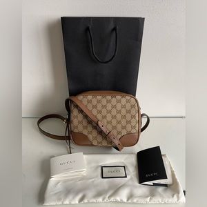 Tan Gucci monogram bag. Used only a few times and includes dust bag, and tags.